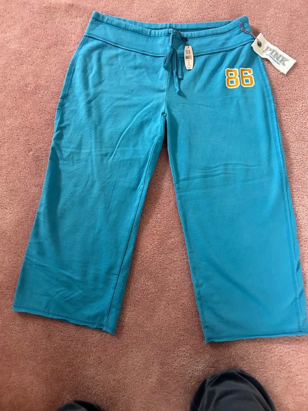 PINK Victoria's Secret Teal Capris with Yellow '86' Patch